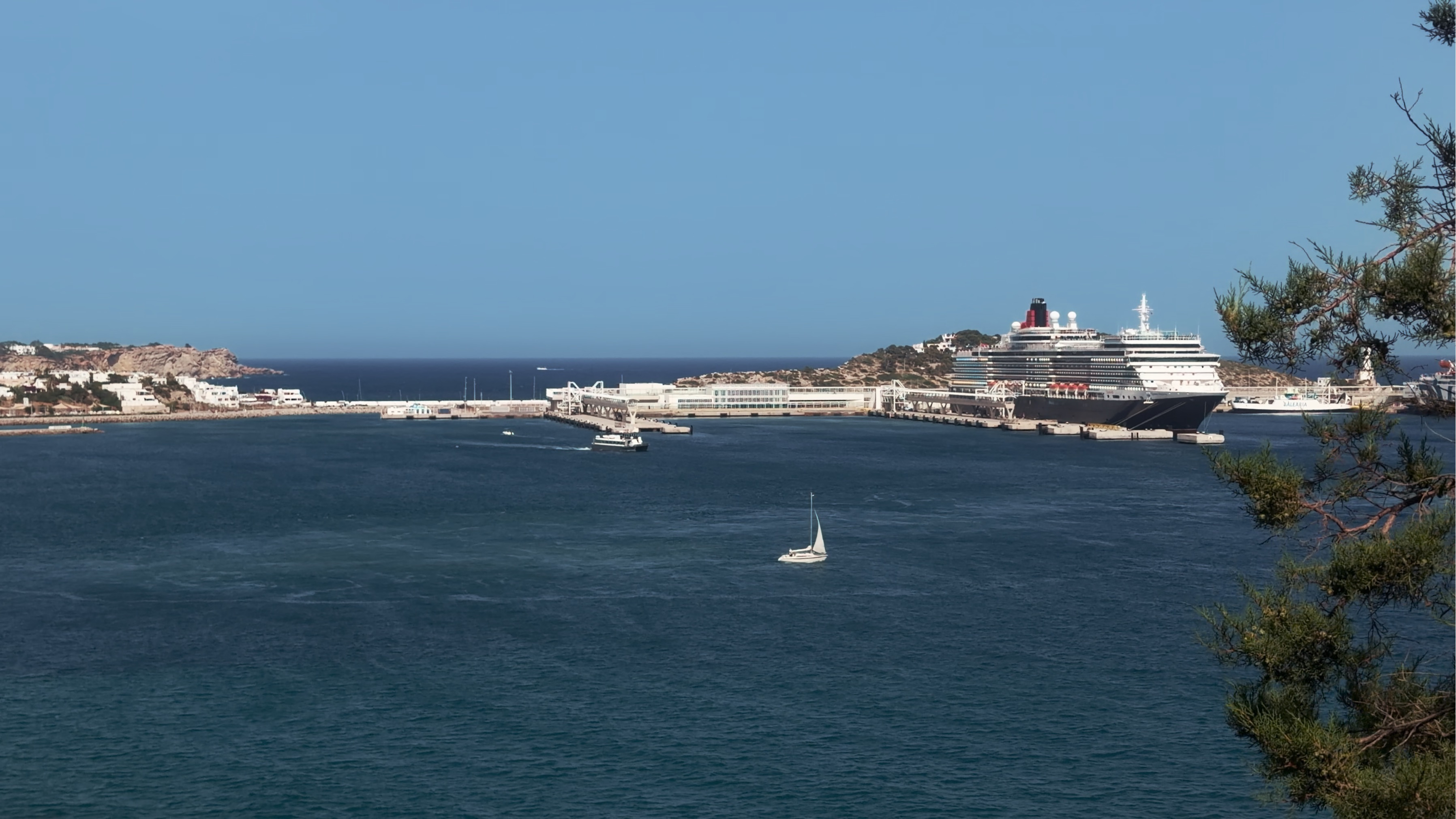 Queen Victoria alongside in the Mediterranean at golden hour